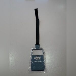 Gucci Guilty Bookmark or Nag Charm with ribbon and metal GG logo.